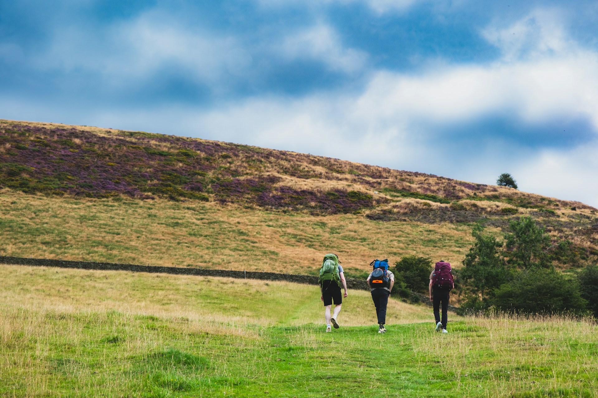 Walkers on Win Hill in the Peak District